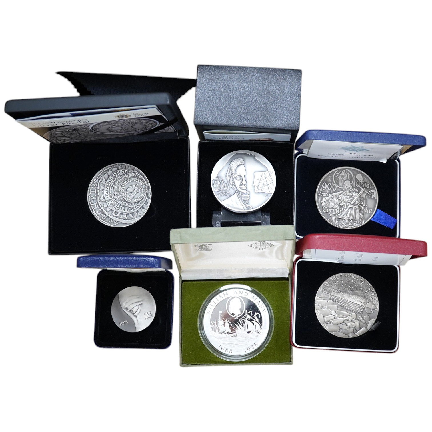 Six large QEII Royal Mint commemorative silver medals